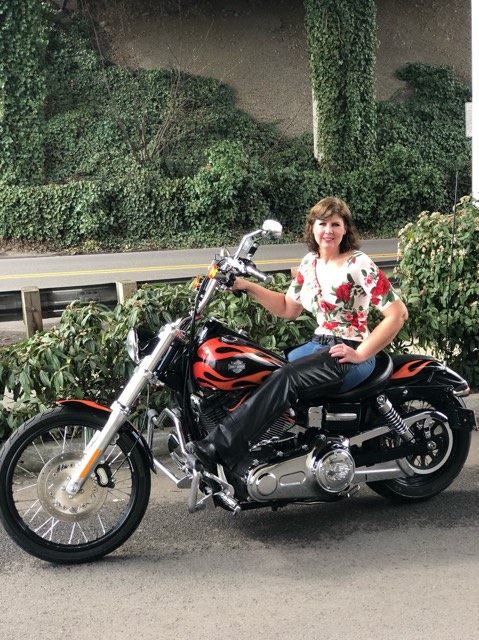 Jacque with Babs (her bike) after losing 80 lbs
