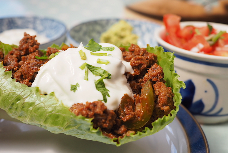 Healthy low carb beef tacos with guacamole and salsa