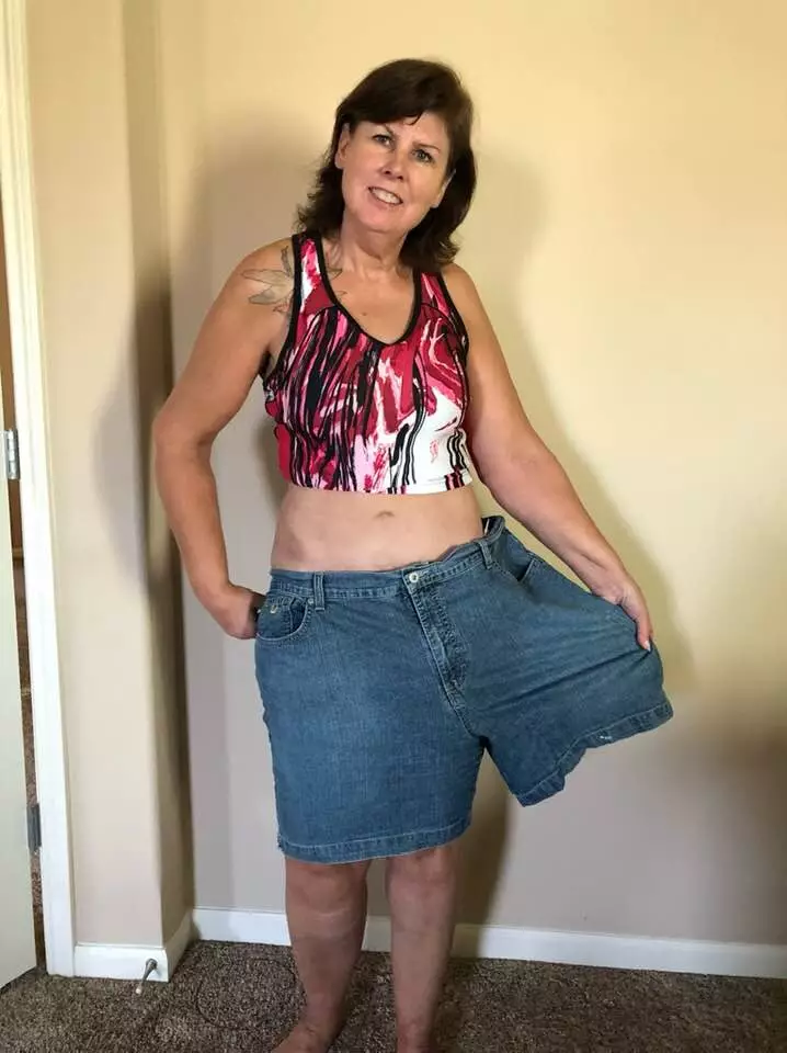 Close to 80 lbs lost, Jacque tried some old shorts.